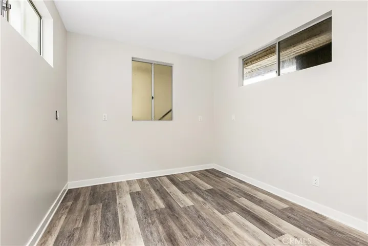 Secondary bedrooms are spacious. One with an added bonus area, the other with a sliding glass door to the side yard.