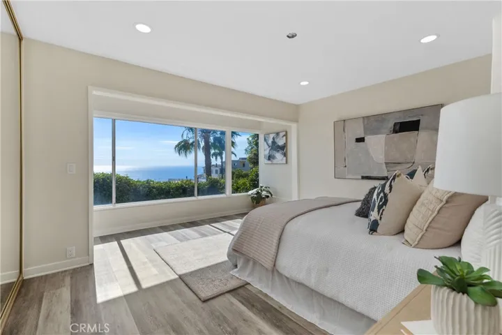 Primary with en-suite offers ocean views and remodeled bathroom.