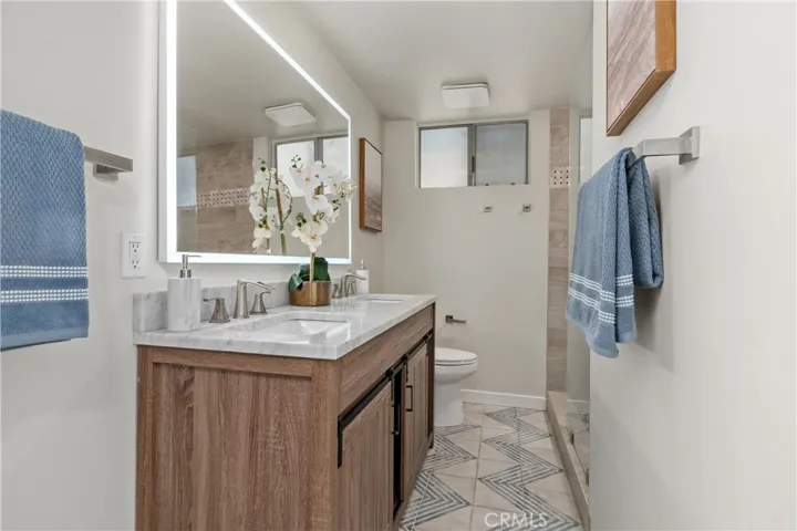 Primary with en-suite offers ocean views and remodeled bathroom.