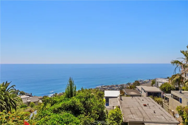 Primary with en-suite offers ocean views and remodeled bathroom.