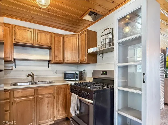 Kitchen has lots of storage, microwave, range & refrigerator included