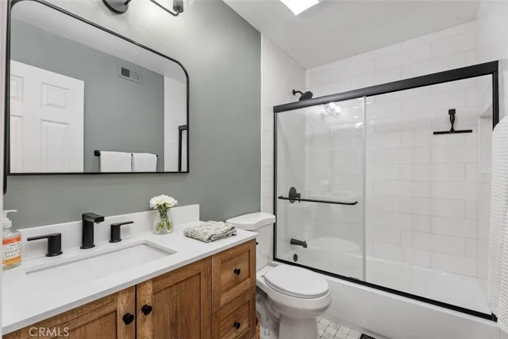 Hallway bathroom is nicely remodeled