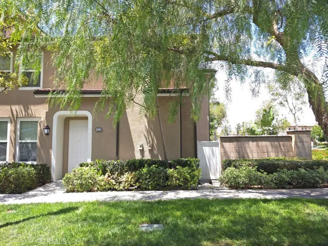 Rarely on market to live on first level, corner unit , side yard / patio with view.