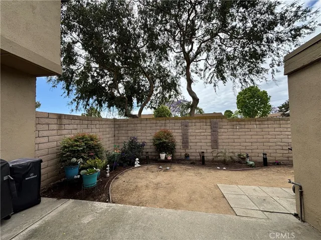 This end unit has an expanded backyard space which most units don't have.