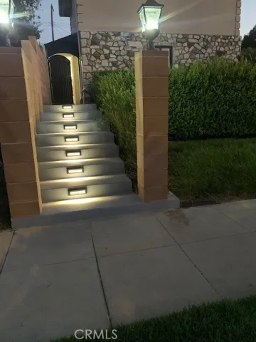 Lighted stairway to the gate