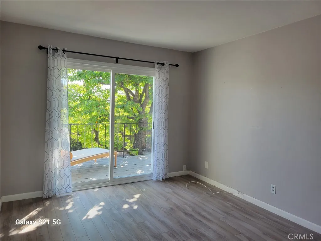 Bedroom with sliders out to deck