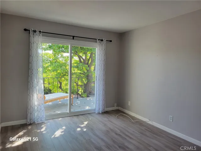Bedroom with sliders out to deck