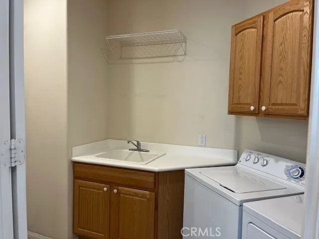 Interior Individual Laundry Room with Sink