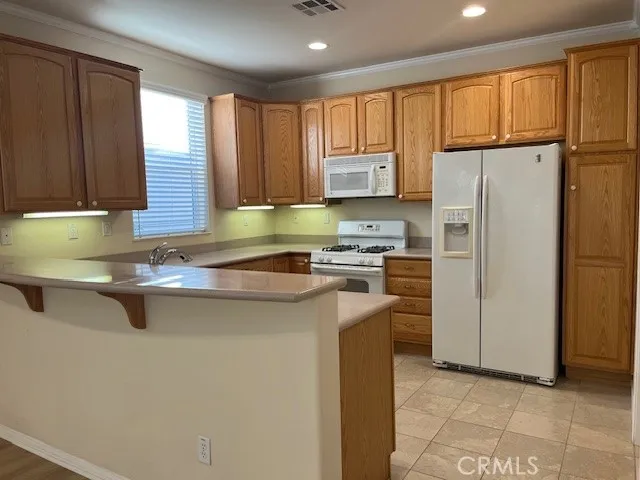 Gas Range, D/W, Microwave and Fridge included