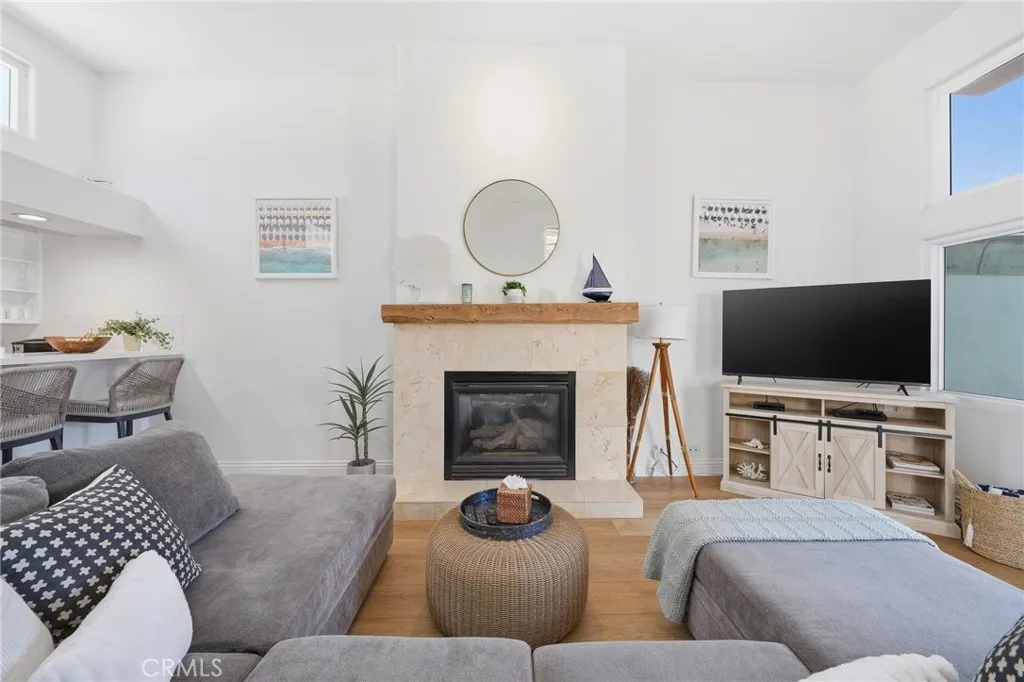 Unit A: Living room area with fireplace