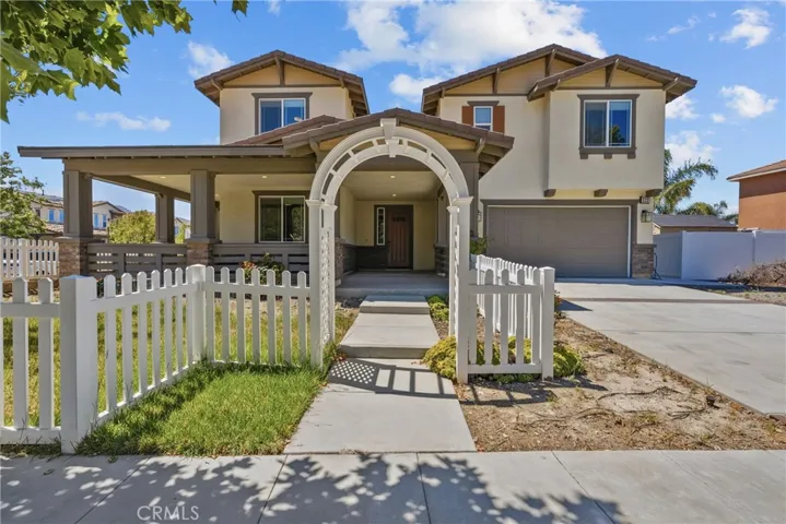 Front view of this gorgeous home showcasing its stunning curb appeal