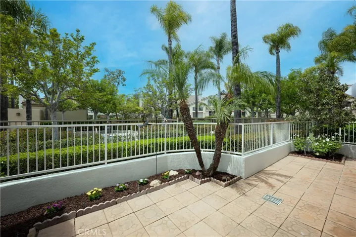 The back patio overlooks the greenbelt and association pool, creating an enjoyable outdoor setting!