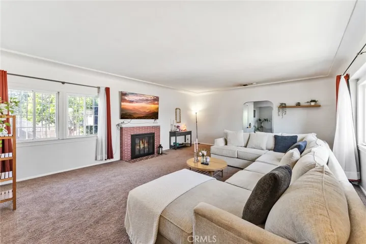 Large family room with wood burning fireplace