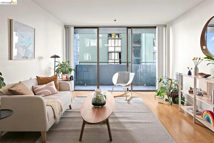 Living area featuring a sliding glass door to a private balcony