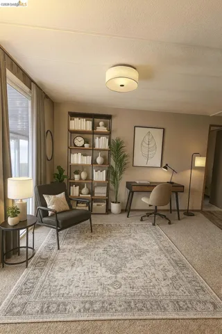 Living area featuring a textured ceiling