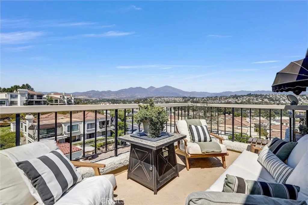 Spacious Patio adjacent to kitchen with mountain, hillside, and LMV beach view