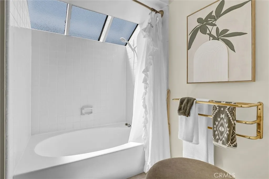 Serene, natural light-filled primary bath retreat