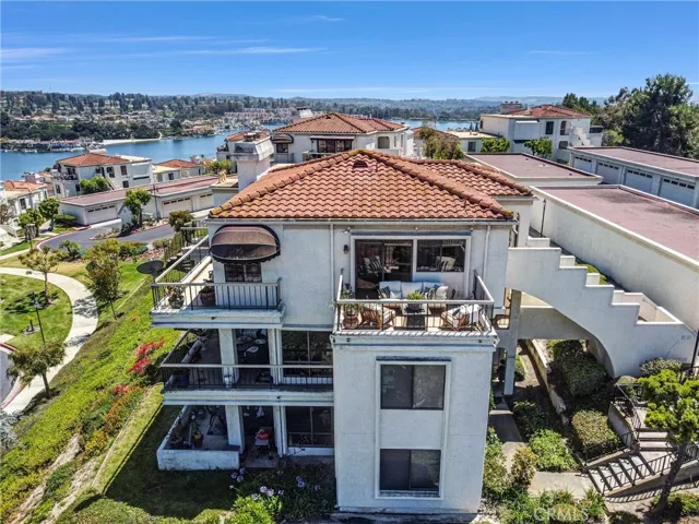 Rare upper-level penthouse located at one of the highest vantage points within the guard-gated Mallorca community