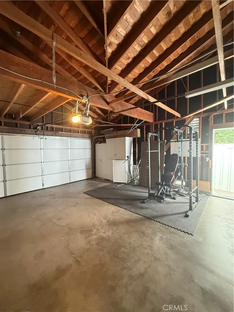two car attached garage has laundry hook ups and direct access to house.