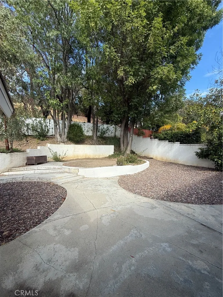 raised brick circular platform perfect space to use for many things from a stage for your own concert, to a lovely dining space or lounging area