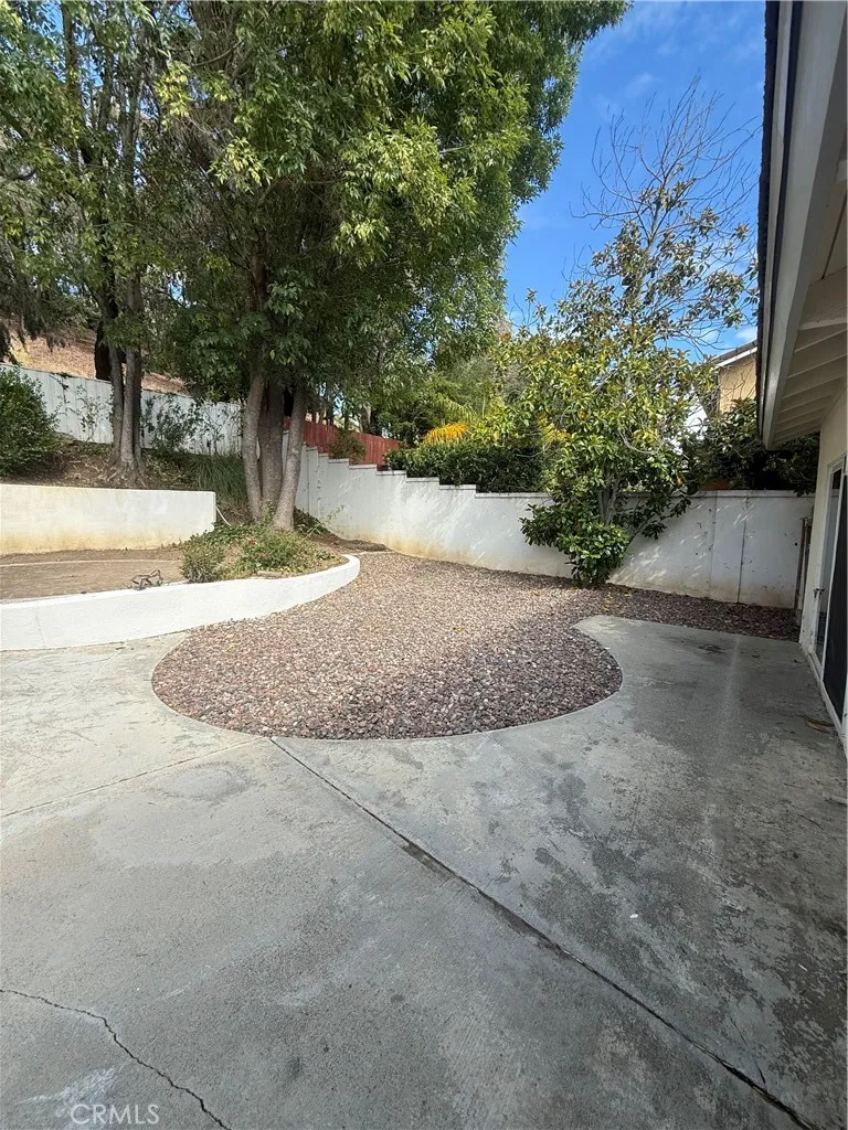 Mature trees provided added shade and privacy