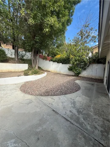 Mature trees provided added shade and privacy