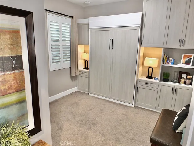 Secondary bedroom with Murphy bed closed