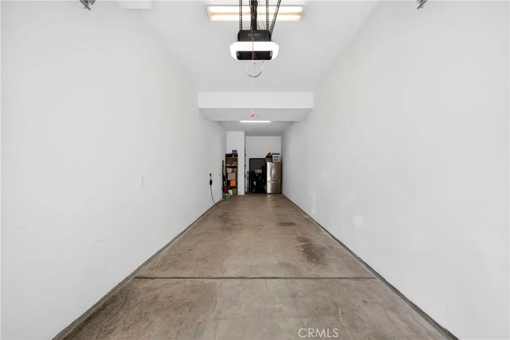 2 car tandem garage with direct access to inside the building
