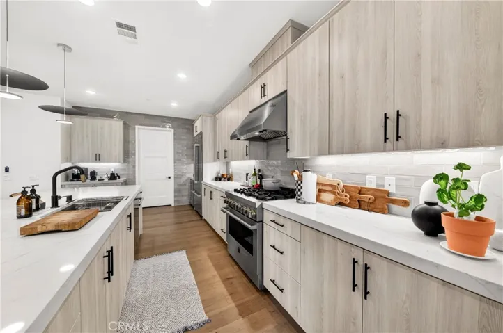 Closer view of kitchen from opposite angle