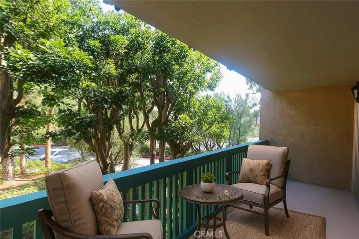Private Balcony Northeast facing with views of trees & landscaping
Photo is Virtually Enhanced