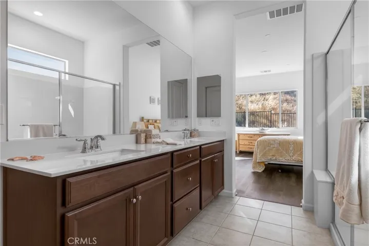 large primary bathroom with walk in shower