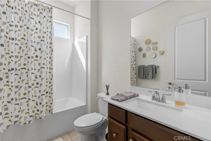 guest bathroom with natural light shinning in