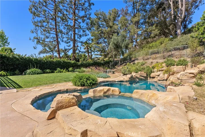 View towards fire pit & back left corner of yard. The ocean is that way.