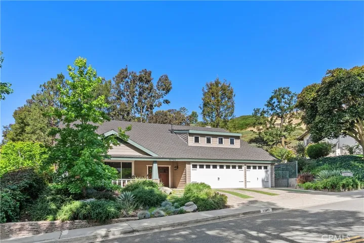 Beautiful, mature trees & plants provide for a beautiful & private view from the porch & formal living room.