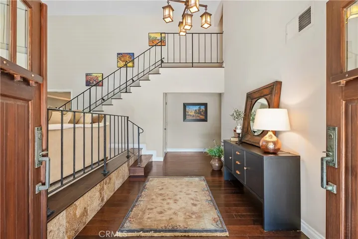 Grand foyer & entry way. Hardwood floors.