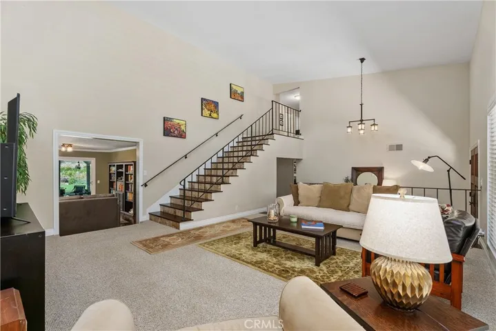 View from corner of the formal living room towards the formal dining room area or bonus room.