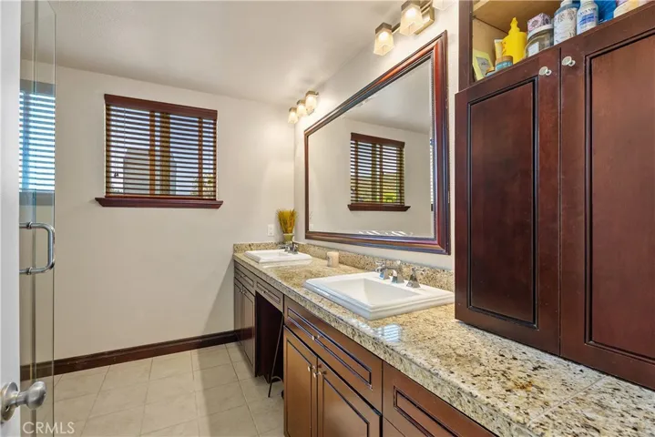 Primary bathroom with shower, tub & double sinks.