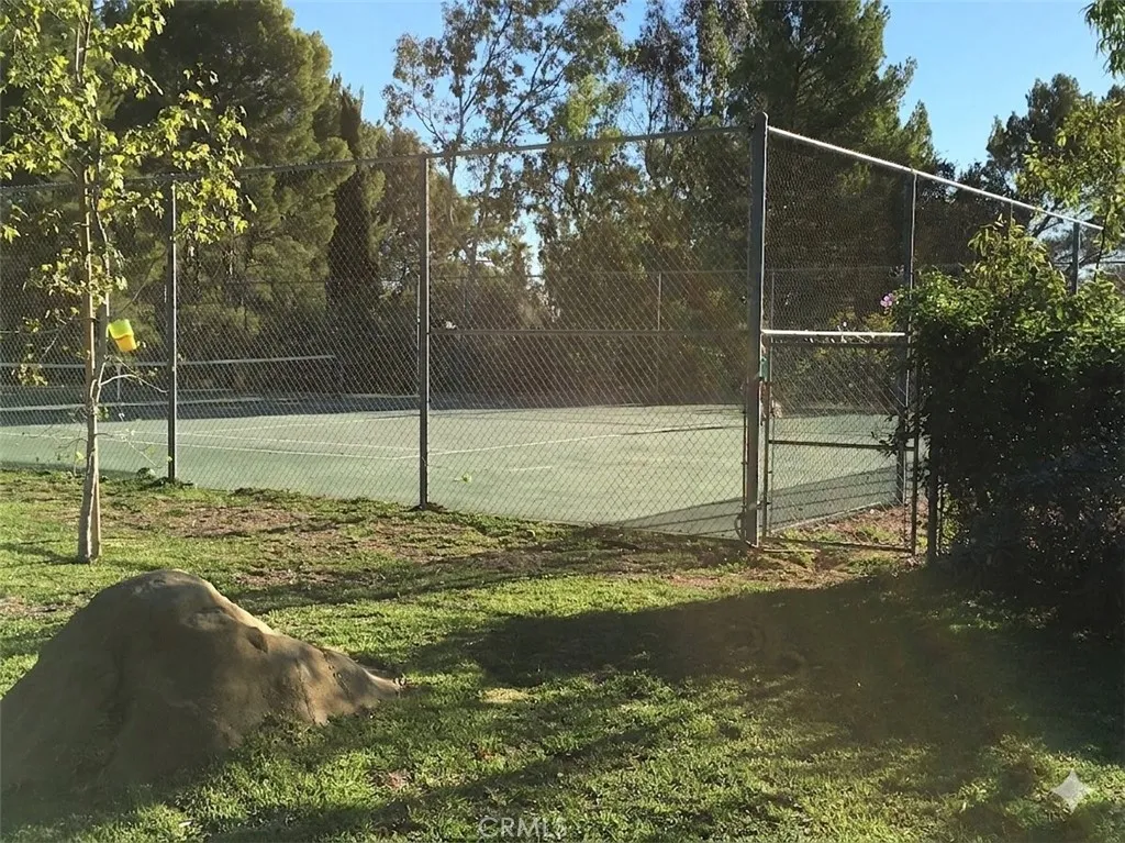 Snapshot of tennis court before the fire