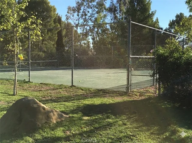 Snapshot of tennis court before the fire