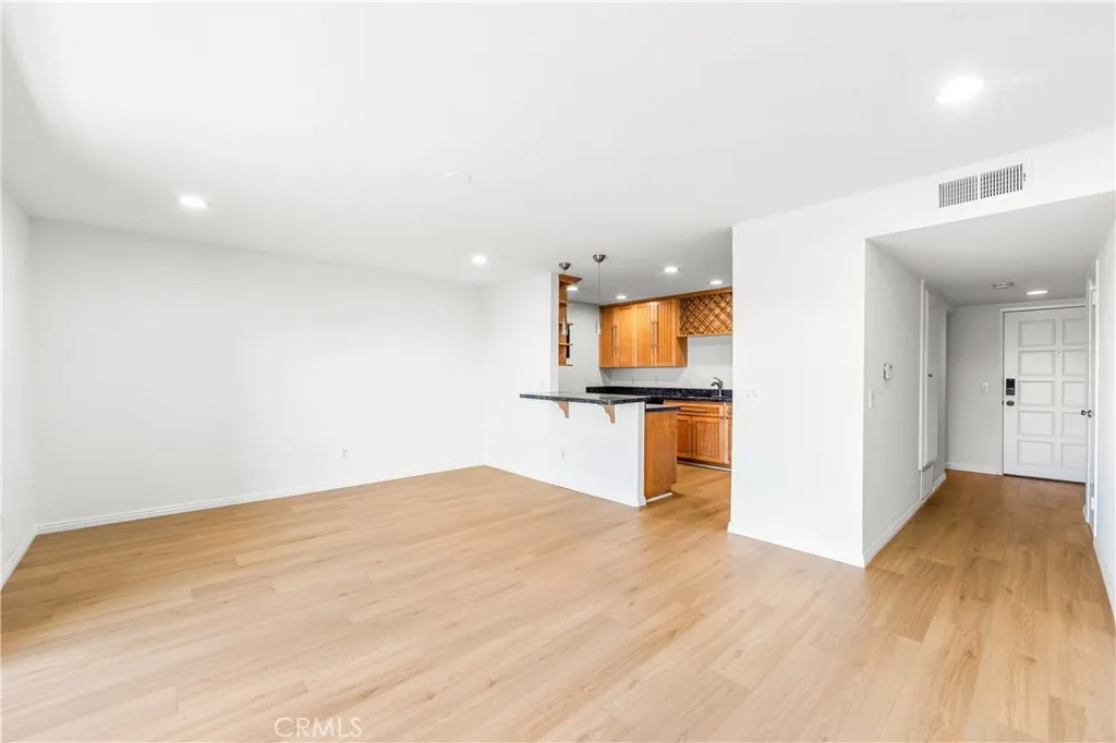 Spacious living room with new beautiful luxury vinyl flooring