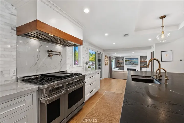 view of kitchen towards the large family room.
TV PICTURE HAS BEEN ADDED.