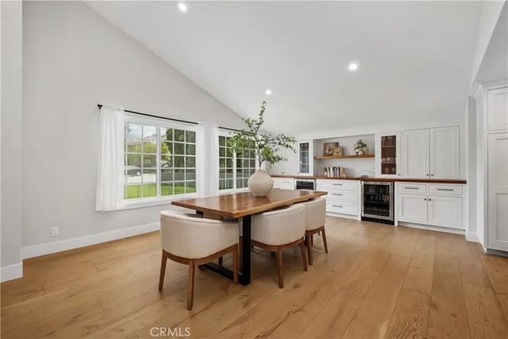 SPACIOUS DINIGN ROOM WITH CUSTOM BUILT INS , BAR WITH TWO WINE REFRIGERATORS, AND PLENTY OF SPACE FOR STORAGE. PERFECT FOR ENTERTAINING.