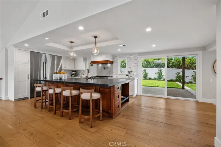 Spacious and enviting kitchen area which opens to the dining and larfe family room.