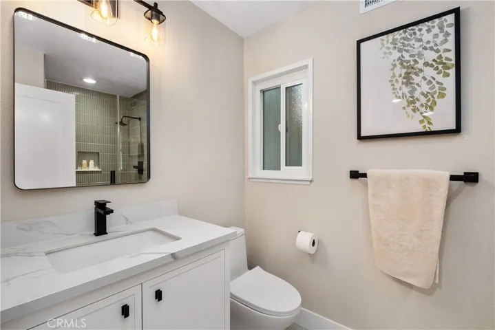 DOWNSTAIRS 3/4 BATH. ALL DESIGNER FINISHES TO PERFECTION.
