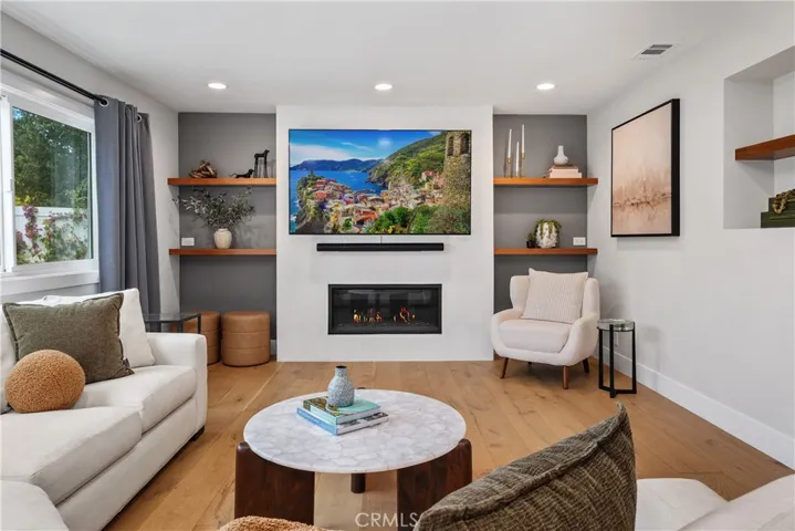 FAMILY ROOM WITH EQUISITE DEISGNER FINISHES.
PICTURE IN TV WAS ADDED.