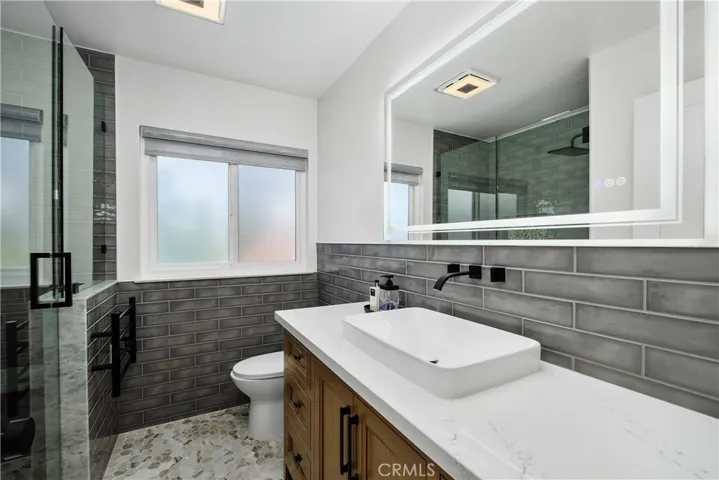 BEAUTIFUL SECONDARY BATHROOM. EVERY DETAIL IS DESIGNER PERFECTION.