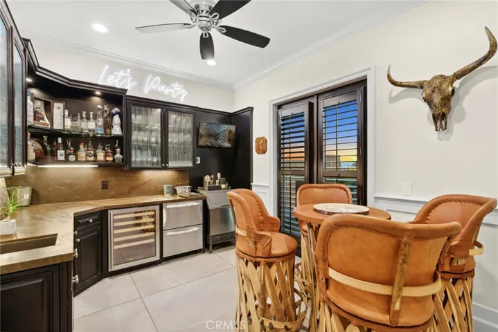 More entertaining in the family bar area with coolers and pro series ice maker.
