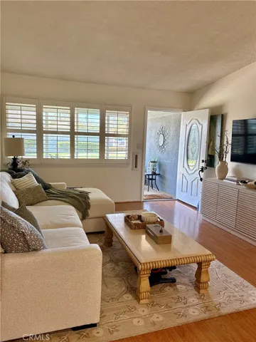 laminate floors, shutters on double pane windows