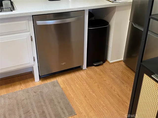Dishwasher and refrigerator are stainless steel
