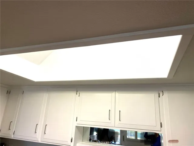 Flared skylight brings more light and space to the kitchen